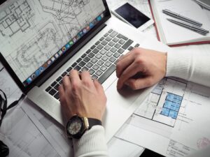 specialist creating design of a ventilation system on the computer