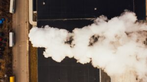 steam coming from industrial exhaust systems in building