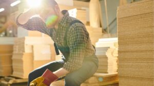 Worker sweating due to inefficient industrial fans and ventilation system